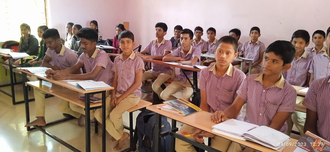 Students at their desks in a classroom