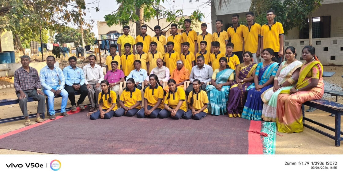 Teachers and senior students in a group photo